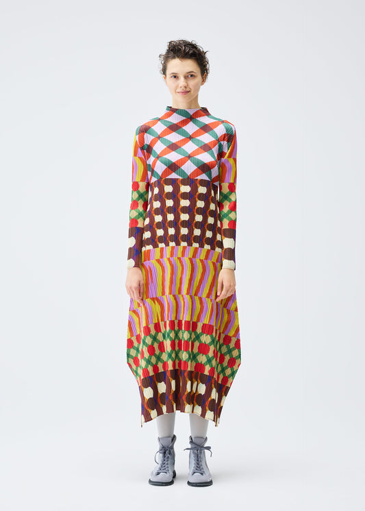 A model wears the Pleats Please Issey Miyake HARMONY dress.
