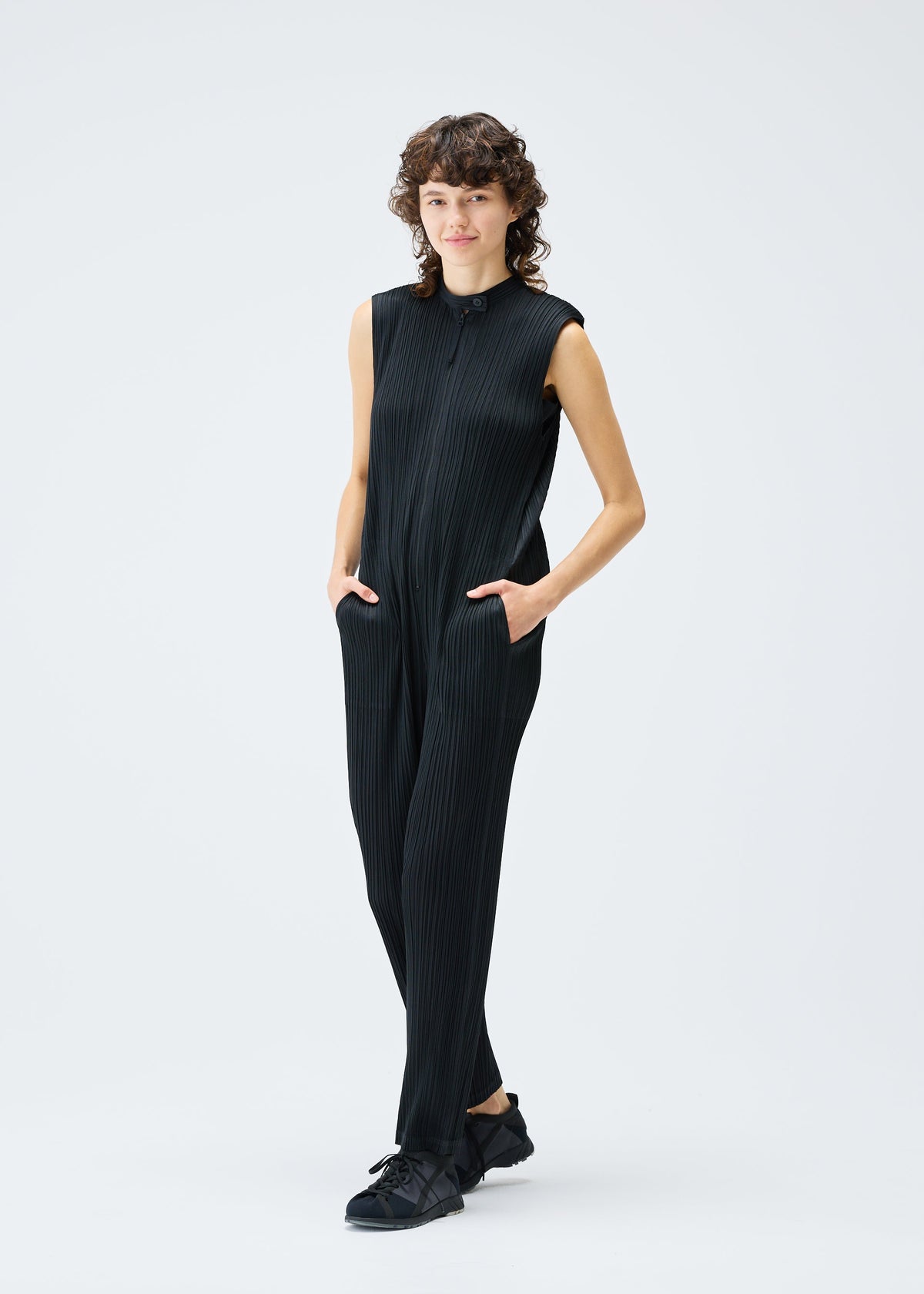 A model wears the Pleats Please Issey Miyake MONTHLY COLORS SEPTEMBER jumpsuit.