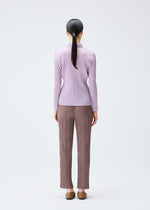 A model wears the Pleats Please Issey Miyake PLEATS Top top.