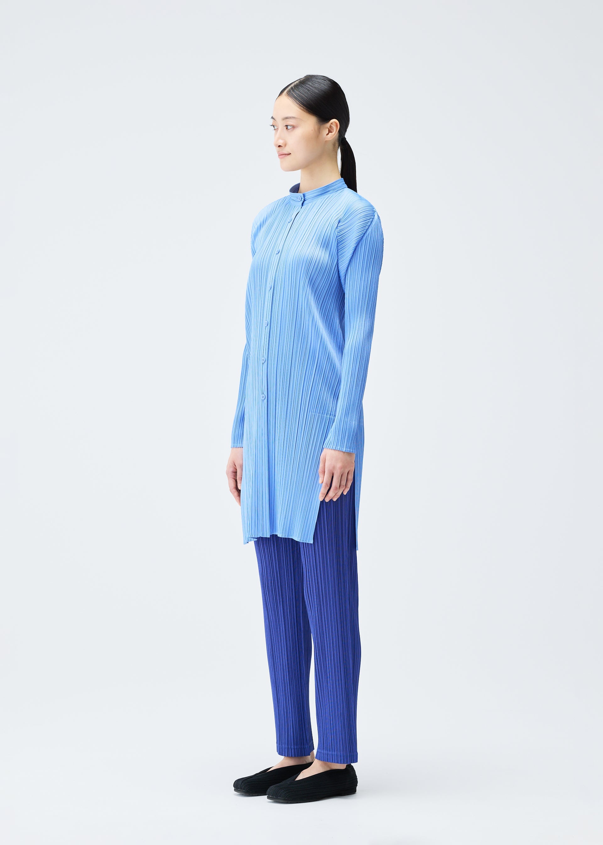 A model wears the Pleats Please Issey Miyake PLEATS Top top.