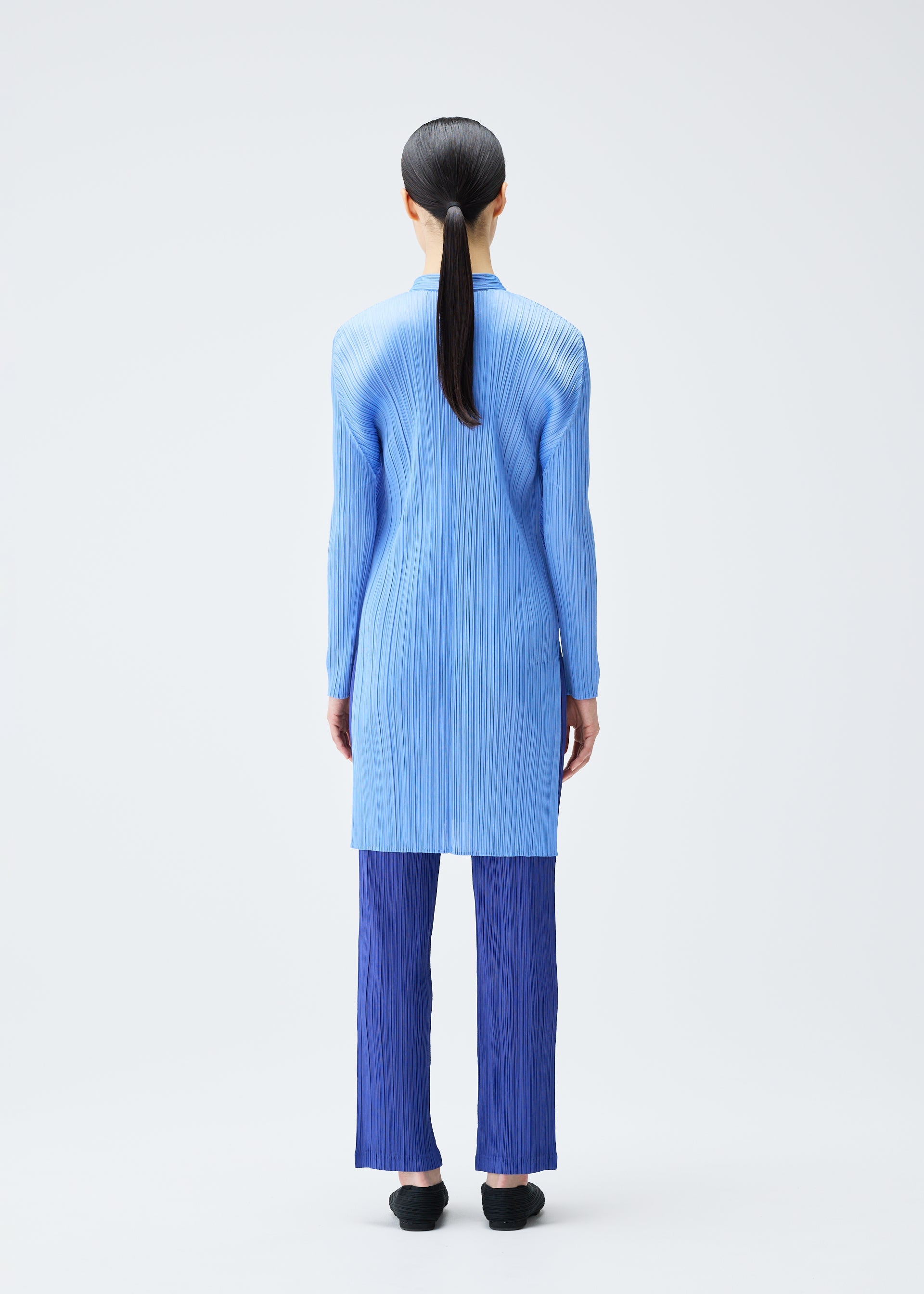 A model wears the Pleats Please Issey Miyake PLEATS Top top.