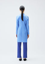 A model wears the Pleats Please Issey Miyake PLEATS Top top.