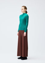 A model wears the Pleats Please Issey Miyake MONTHLY COLORS : NOVEMBER shirt.