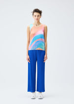 A model wears the PLEATS PLEASE ISSEY MIYAKE GROOVE top.