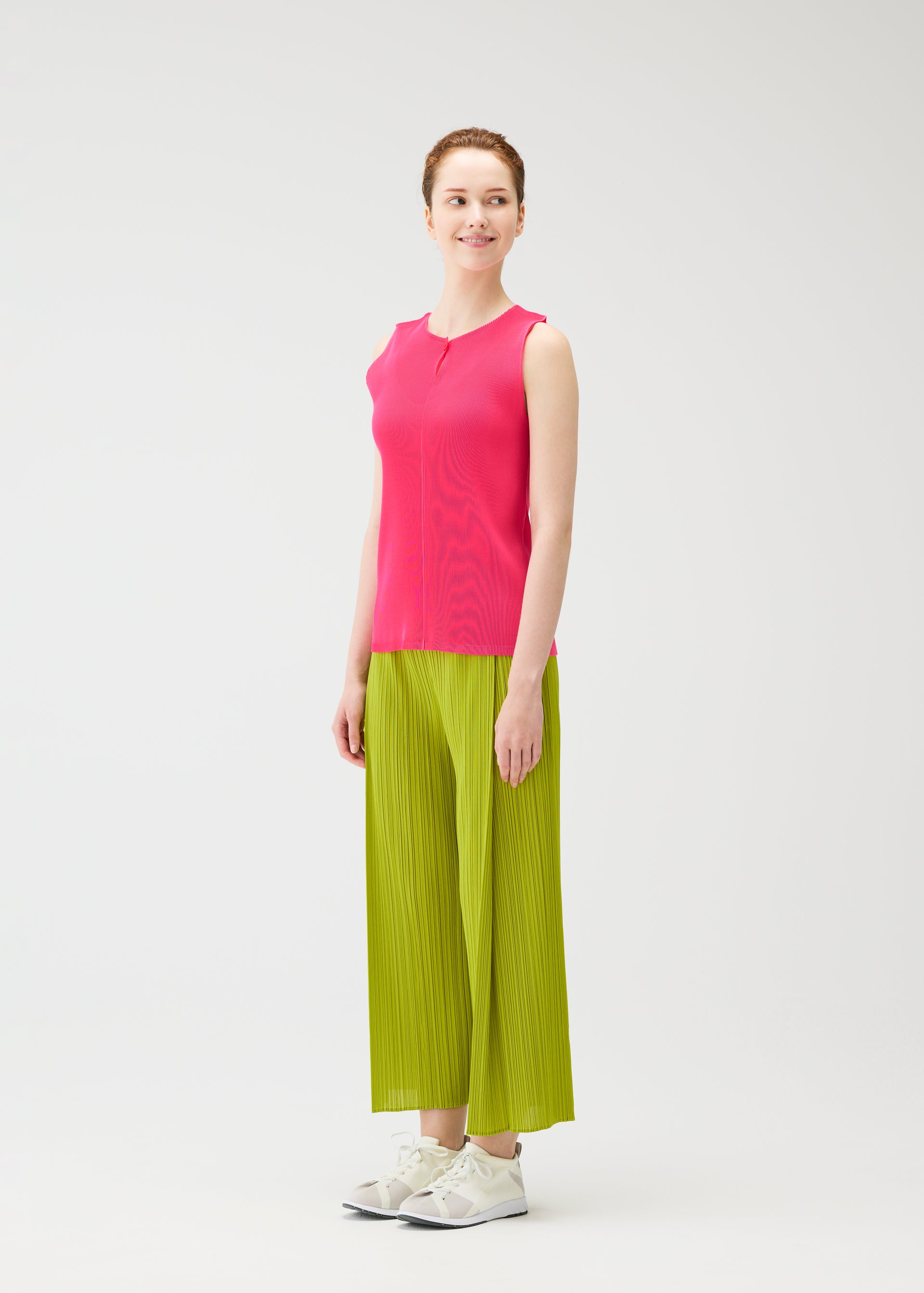 A model wears the PLEATS PLEASE ISSEY MIYAKE MIST JUNE mist-june-shirt-charcoal.