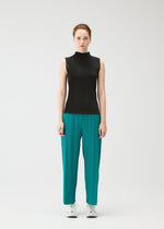 A model wears the PLEATS PLEASE ISSEY MIYAKE MIST JUNE mist-june-shirt-yellow-green-1.