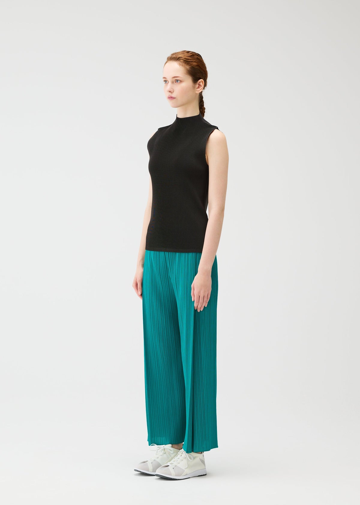 A model wears the PLEATS PLEASE ISSEY MIYAKE MIST JUNE mist-june-shirt-charcoal-1.