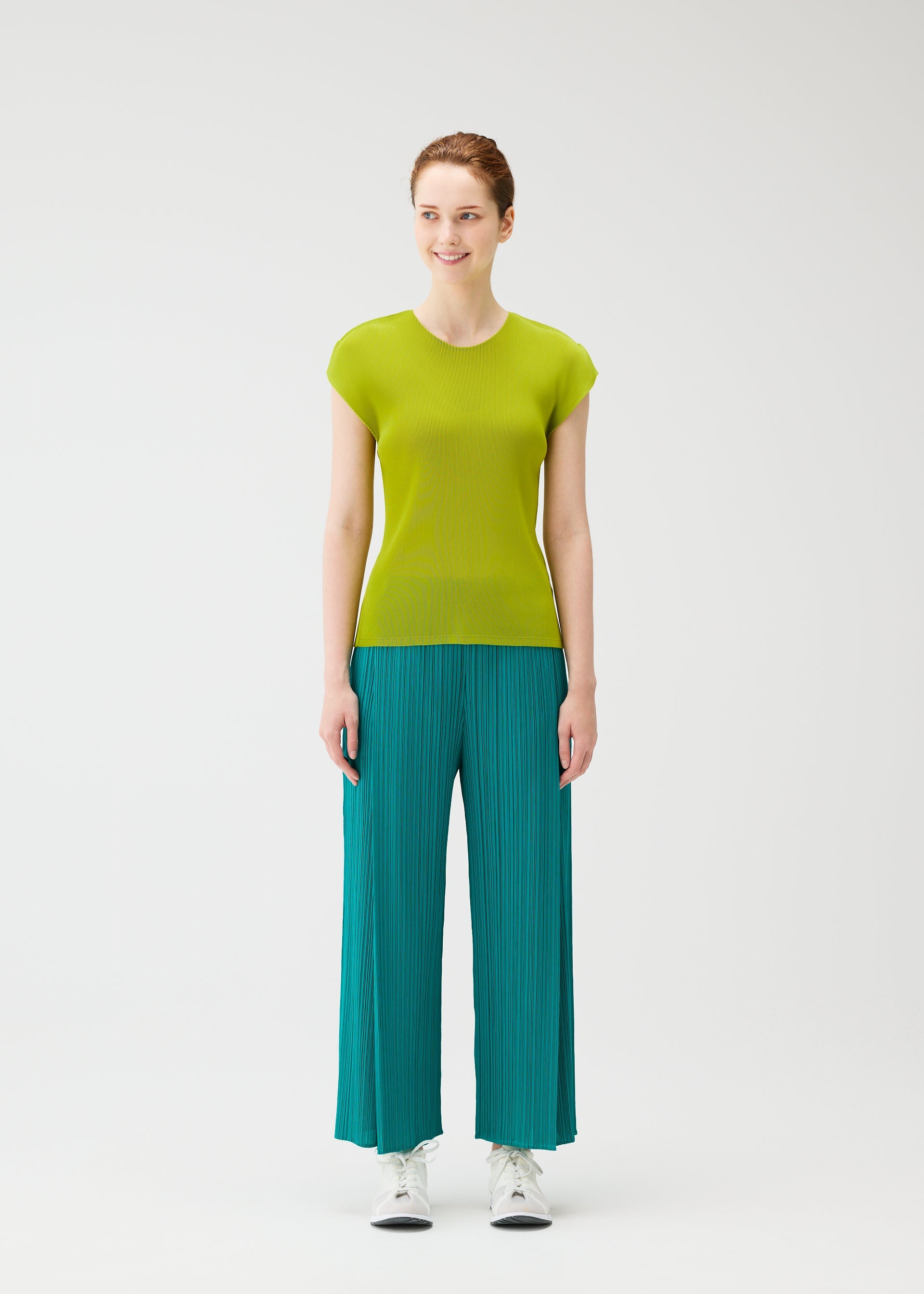 A model wears the PLEATS PLEASE ISSEY MIYAKE MIST JUNE mist-june-shirt-charcoal-2.