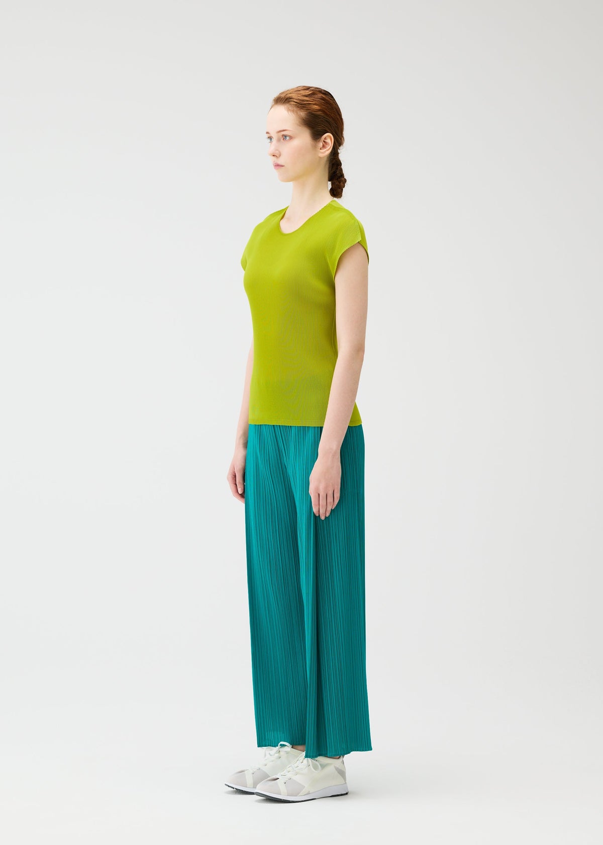 A model wears the PLEATS PLEASE ISSEY MIYAKE MIST JUNE mist-june-shirt-charcoal-2.