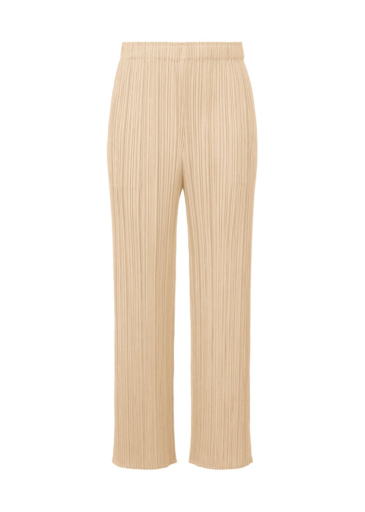 A product shot of the Pleats Please Issey Miyake MONTHLY COLORS MAY trousers in sand beige (43), recurring_style.