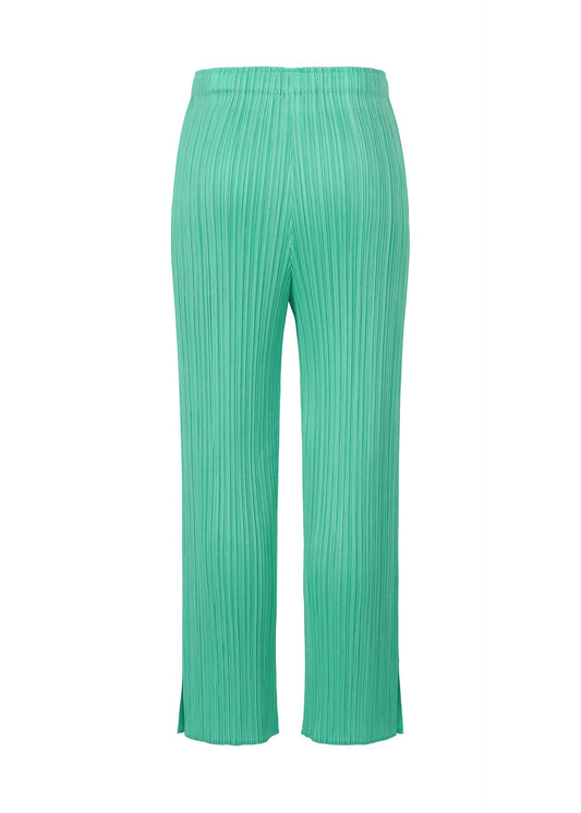 A detail shot of the Pleats Please Issey Miyake MONTHLY COLORS MAY trousers.