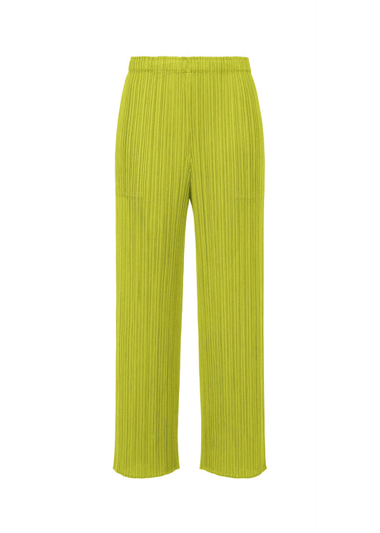 A product shot of the PLEATS PLEASE ISSEY MIYAKE MONTHLY COLORS : JUNE trousers in yellow green.