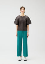A model wears the PLEATS PLEASE ISSEY MIYAKE MONTHLY COLORS : JUNE monthly-colors-june-trousers-pink-beige-2.