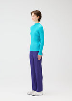 A model wears the PLEATS PLEASE ISSEY MIYAKE THICKER BOTTOMS 1 prêt à porter.