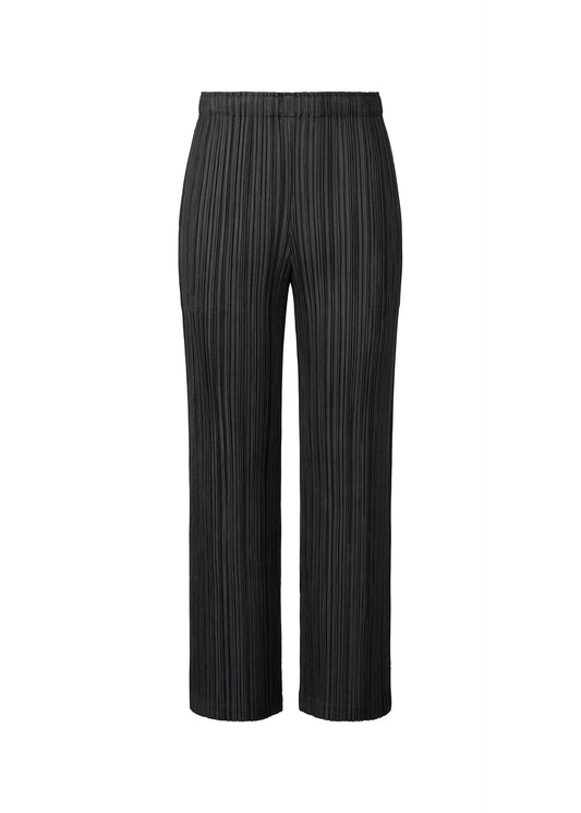 A product shot of the Pleats Please Issey Miyake THICKER BOTTOMS 2 prêt à porter in .