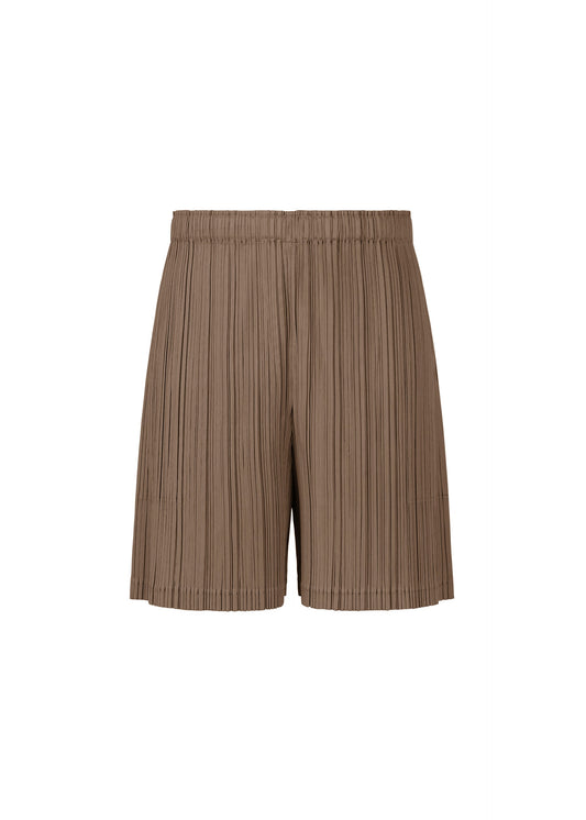 A product shot of the Pleats Please Issey Miyake LOOP BOTTOMS trousers in dark brown (45), recurring_style.