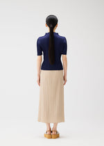 A model wears the Pleats Please Issey Miyake MONTHLY COLORS MAY skirt.