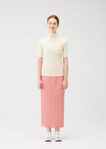 A model wears the Pleats Please Issey Miyake THICKER BOTTOMS 2 prêt à porter.