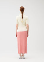 A model wears the Pleats Please Issey Miyake THICKER BOTTOMS 2 prêt à porter.