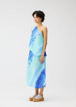 A model wears the Pleats Please Issey Miyake SEA BUBBLE skirt.