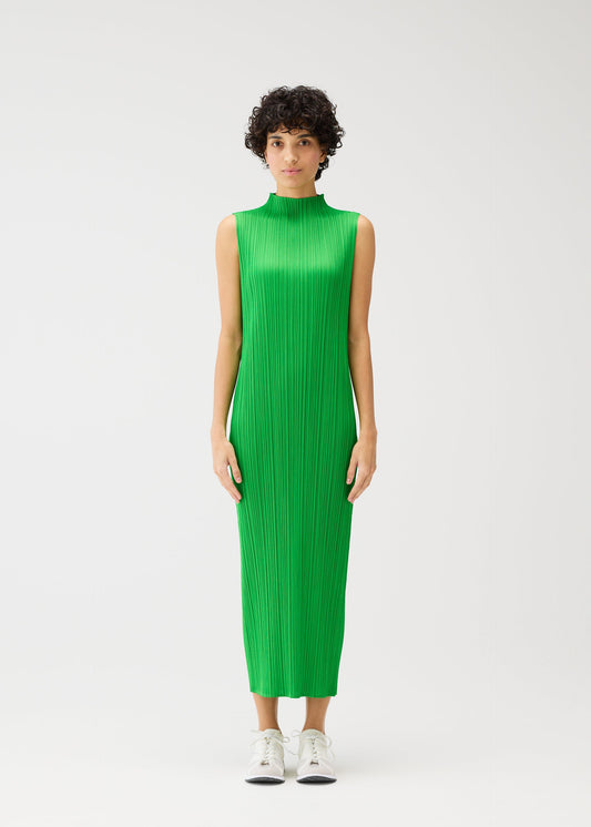 A model wears the Pleats Please Issey Miyake MONTHLY COLORS dress.