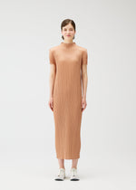 A model wears the PLEATS PLEASE ISSEY MIYAKE MONTHLY COLORS : JUNE monthly-colors-june-dress-blue-green-1.