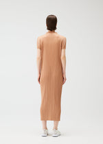 A model wears the PLEATS PLEASE ISSEY MIYAKE MONTHLY COLORS : JUNE monthly-colors-june-dress-blue-green-1.