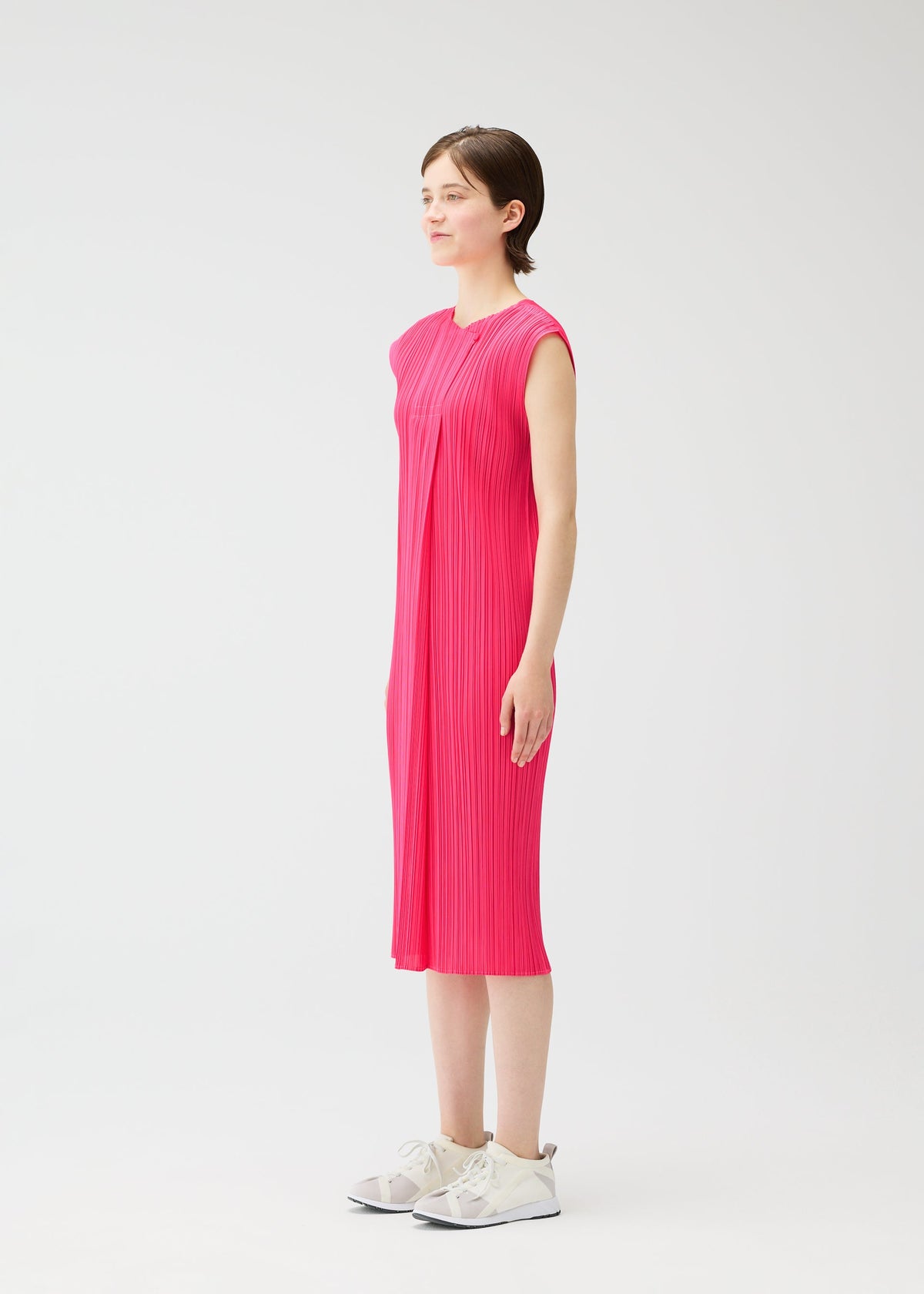 A model wears the PLEATS PLEASE ISSEY MIYAKE MONTHLY COLORS : JUNE monthly-colors-june-dress-blue-green-3.