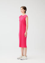 A model wears the PLEATS PLEASE ISSEY MIYAKE MONTHLY COLORS : JUNE monthly-colors-june-dress-yellow-green-2.