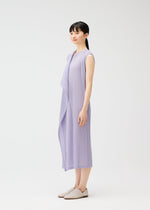 A model wears the Pleats Please Issey Miyake RAMIE PLEATS prêt à porter.