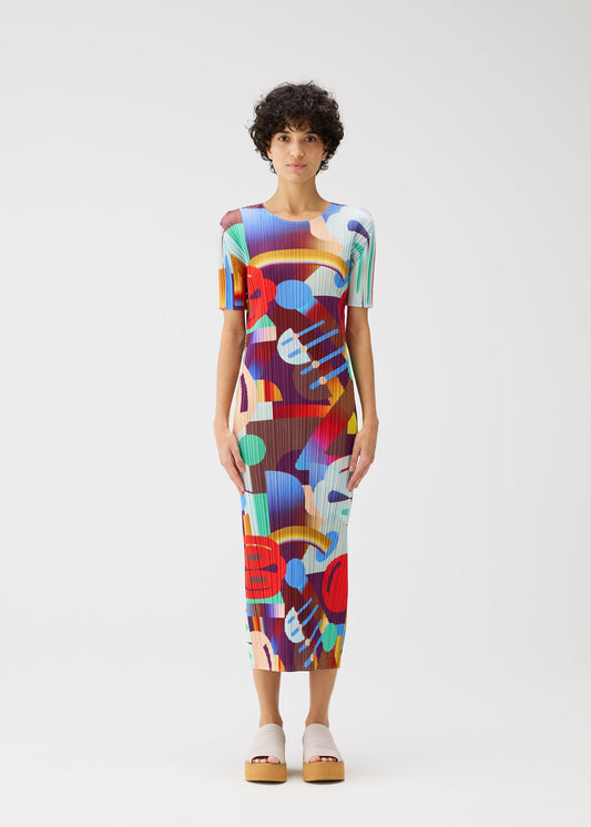 A model wears the Pleats Please Issey Miyake SODA POPS dress.