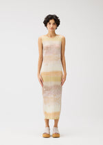 A model wears the Pleats Please Issey Miyake SEA BUBBLE dress.