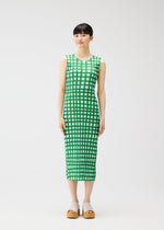 A model wears the PLEATS PLEASE ISSEY MIYAKE BASKET basket-dress-navy.