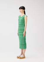 A model wears the PLEATS PLEASE ISSEY MIYAKE BASKET basket-dress-navy.