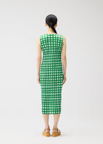 A model wears the PLEATS PLEASE ISSEY MIYAKE BASKET basket-dress-navy.