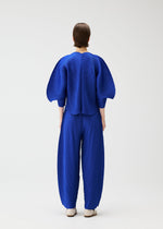 A model wears the PLEATS PLEASE ISSEY MIYAKE COAST pp66jk46143os.