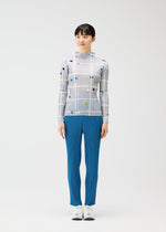 A model wears the PLEATS PLEASE ISSEY MIYAKE CROSSING DOTS prêt à porter.