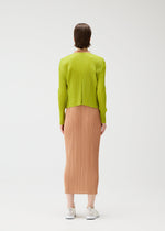 A model wears the PLEATS PLEASE ISSEY MIYAKE MONTHLY COLORS : JUNE monthly-colors-june-cardigan-charcoal.