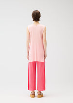 A model wears the Pleats Please Issey Miyake MONTHLY COLORS MARCH prêt à porter.