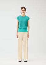 A model wears the Pleats Please Issey Miyake FISHNET KNIT vest.
