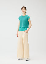 A model wears the Pleats Please Issey Miyake FISHNET KNIT vest.