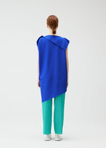 A model wears the Pleats Please Issey Miyake A POC SEA GLASS shirt.