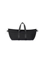 A product shot of the PLEATS PLEASE ISSEY MIYAKE PLEATS BOSTON BAG bag in black.