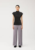 A model wears the PLEATS PLEASE ISSEY MIYAKE MIST AUGUST mist-august-shirt-charcoal.