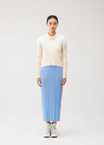 A model wears the PLEATS PLEASE ISSEY MIYAKE MONTHLY COLORS : AUGUST monthly-colors-august-blouson-off-white.