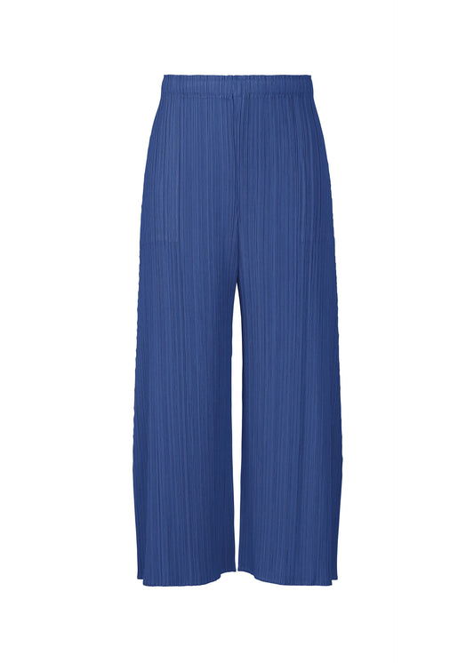 A product shot of the PLEATS PLEASE ISSEY MIYAKE MONTHLY COLORS : JULY trousers in blue.