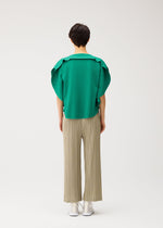 A model wears the PLEATS PLEASE ISSEY MIYAKE THICKER BOTTOMS 1 thicker-bottoms-1-pants-2.