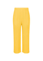 A product shot of the PLEATS PLEASE ISSEY MIYAKE THICKER BOTTOMS 1 pants in yellow.