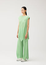 A model wears the PLEATS PLEASE ISSEY MIYAKE FOLD fold-trousers-black.