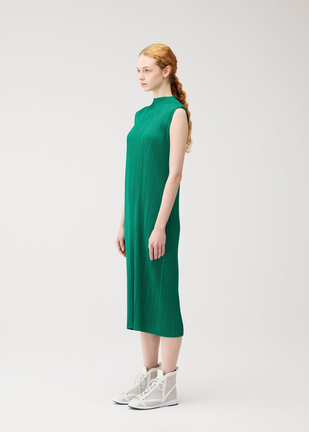 A model wears the PLEATS PLEASE ISSEY MIYAKE MONTHLY COLORS : JULY monthly-colors-july-dress-blue-4.